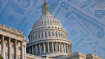 Capitol with dollars.  Budget, spending.