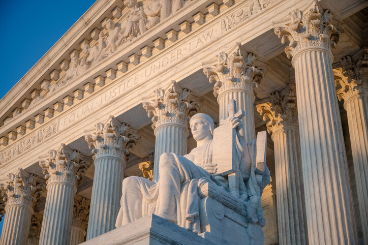 The sun rises over the Supreme Court. 