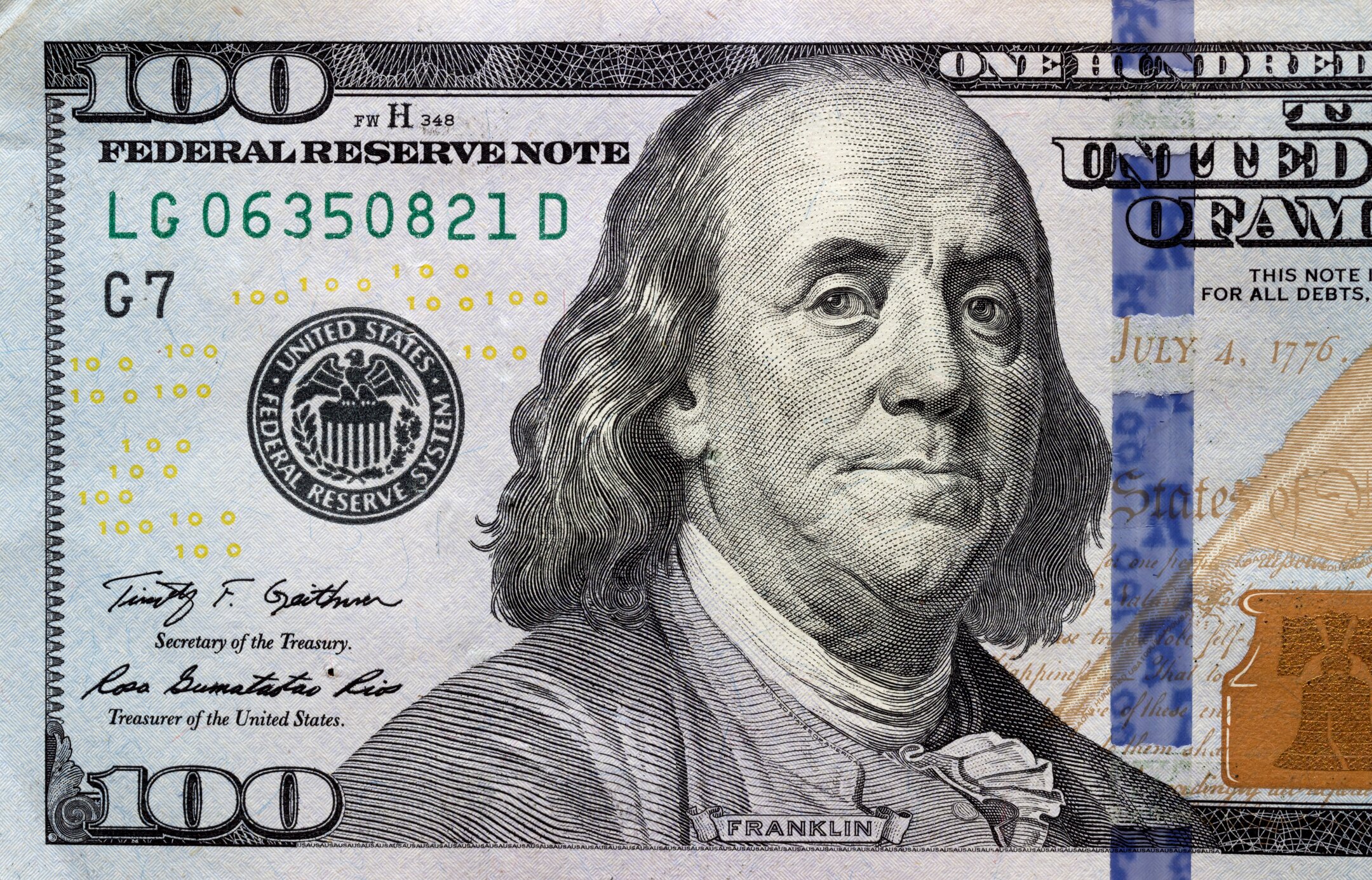 Closeup of Ben Franklin on a hundred dollar bill 