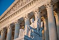 The sun rises over the Supreme Court. 