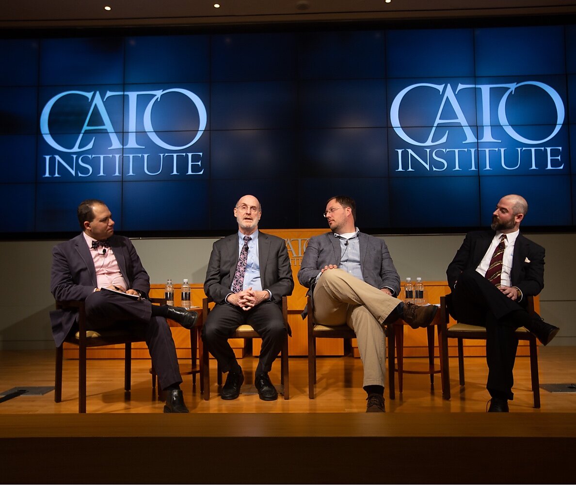 Cato Scholars Speaking at an Event in the Auditorium