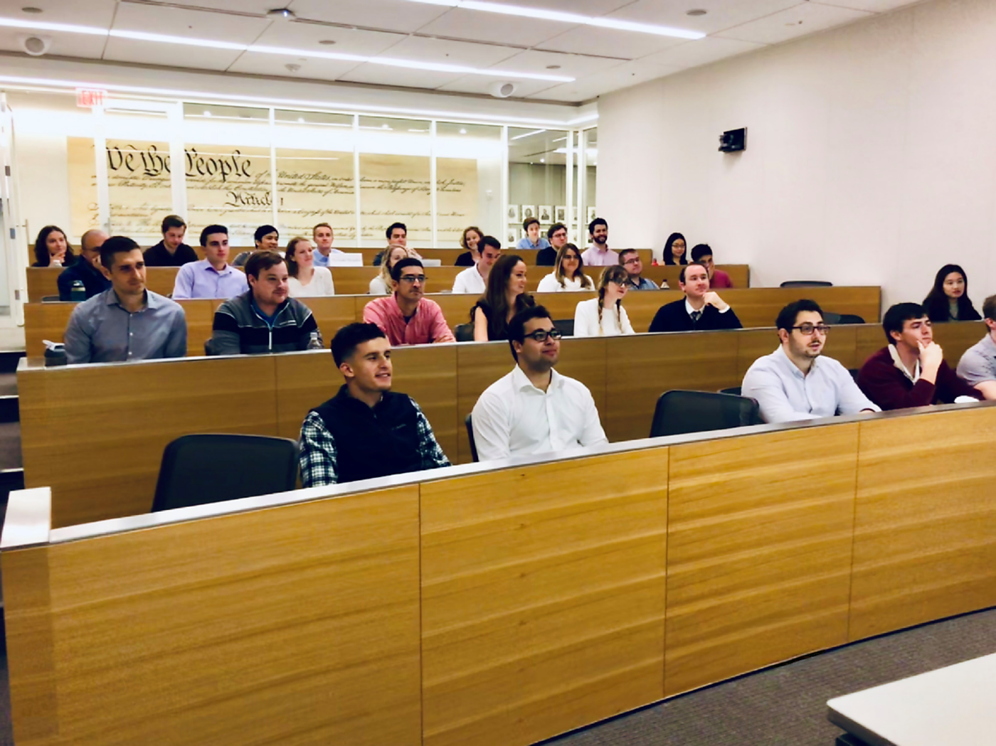 Interns sitting in auditorium style seating