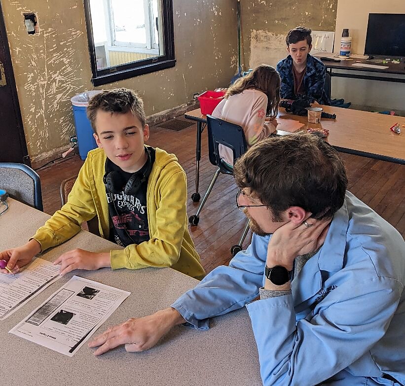 Students learning at Eyes and Brains STEM Center.